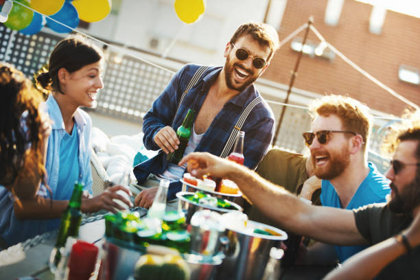 istock Rooftop party on a summer afternoon. 1167945162