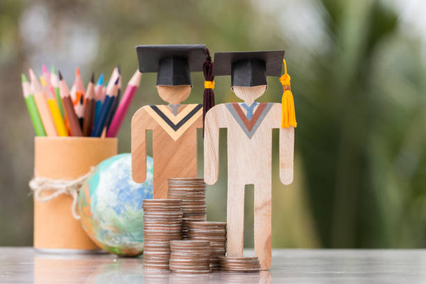 istock Concept of Budget for education learning scholaship financial fee payment, models people in university knowledge achievement for study abroad international have to money expensive for fees student 1167946387