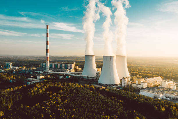 istock A Power plant with white smoke over it's chimneys 1167952479