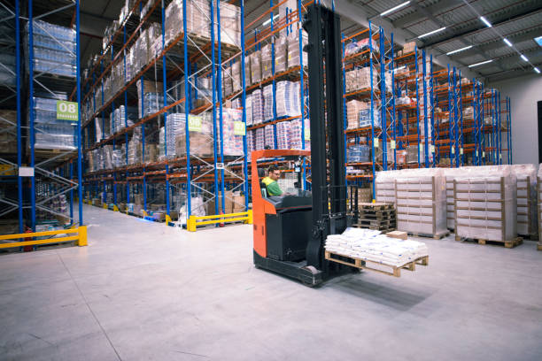 Logistics employees are working warehouse. Labor and logistics.