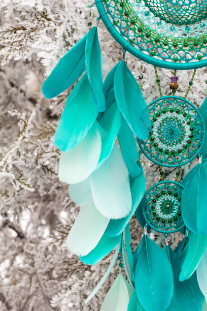 istock Handmade dream catcher with feathers threads and beads rope hanging 1167962548