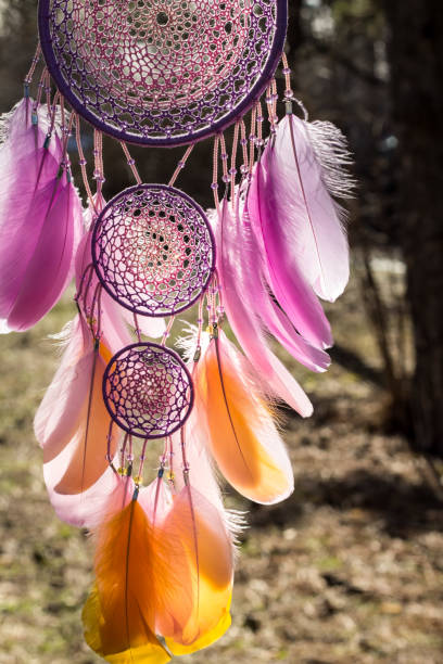 istock Handmade dream catcher with feathers threads and beads rope hanging 1167963110