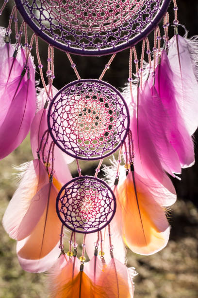 istock Handmade dream catcher with feathers threads and beads rope hanging 1167963123