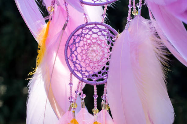 istock Handmade dream catcher with feathers threads and beads rope hanging 1167963159