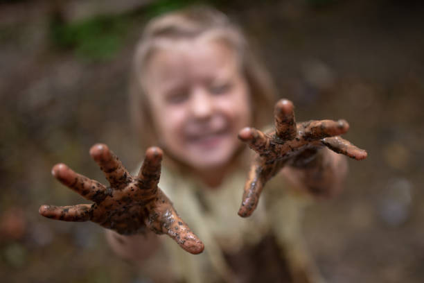 istock Girl playing in forest 1167963586