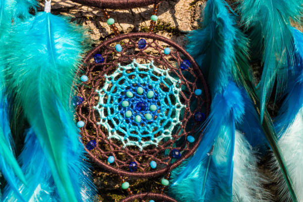 istock Handmade dream catcher with feathers threads and beads rope hanging 1167963996