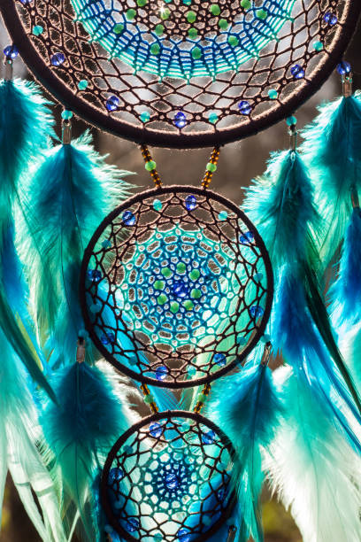 istock Handmade dream catcher with feathers threads and beads rope hanging 1167964097