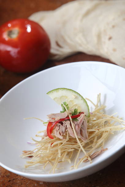 istock Tomato soup with tortilla strips and beef. 1167965353