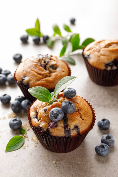 istock Blueberry muffins with fresh berries 1167966242