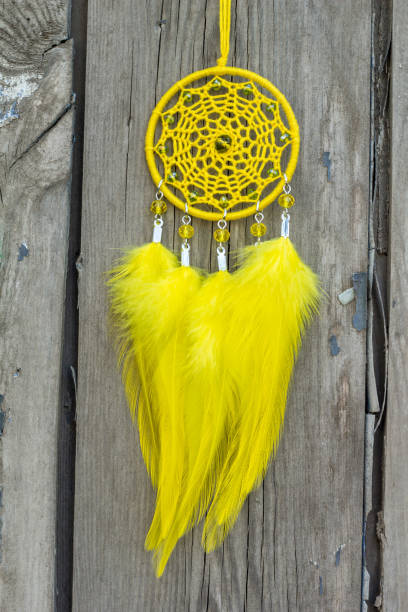 istock Handmade dream catcher with feathers threads and beads rope hanging 1167966990
