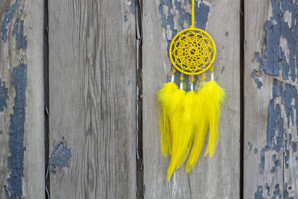 istock Handmade dream catcher with feathers threads and beads rope hanging 1167967026
