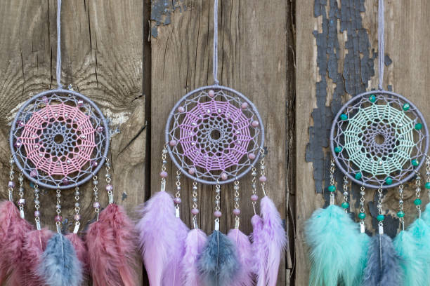 istock Handmade dream catcher with feathers threads and beads rope hanging 1167967061