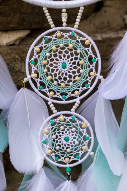 istock Handmade dream catcher with feathers threads and beads rope hanging 1167967137