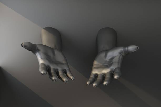 istock black hands stretched out of the wall 1167968178