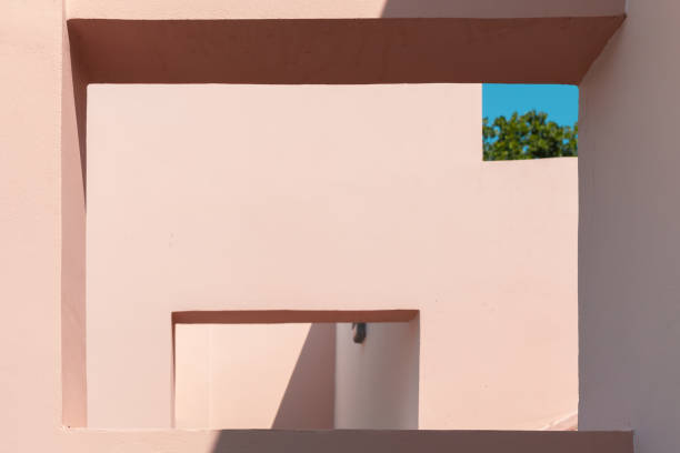 istock Niches in pink painted concrete walls 1167969586