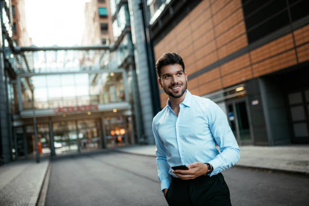istock Millennial businessman using phone for business plannings 1167971126