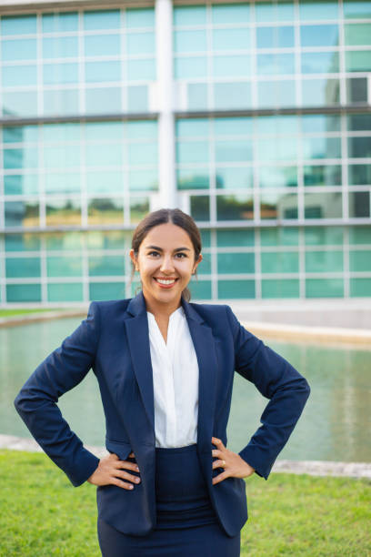 istock Happy confident young professional posing outside 1167971438
