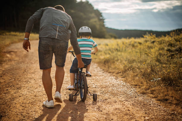 istock Father and son spending time in nature 1167971500