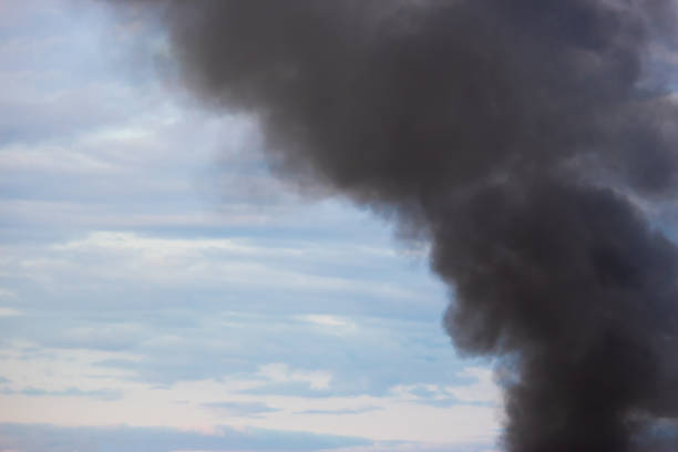 istock Factory chimney smoking, heavy black smoke on the sky. 1167972013