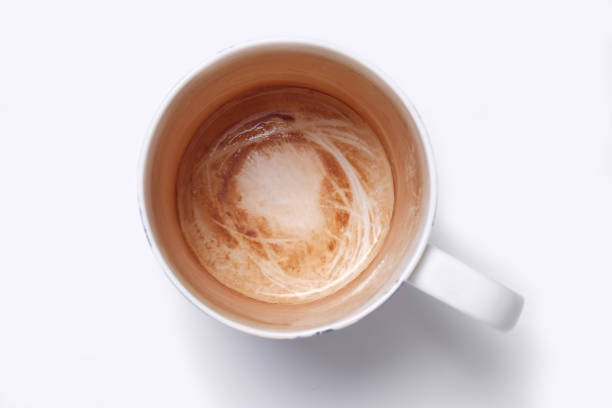 istock overhead shot of mug with tea stains left inside 1167972871