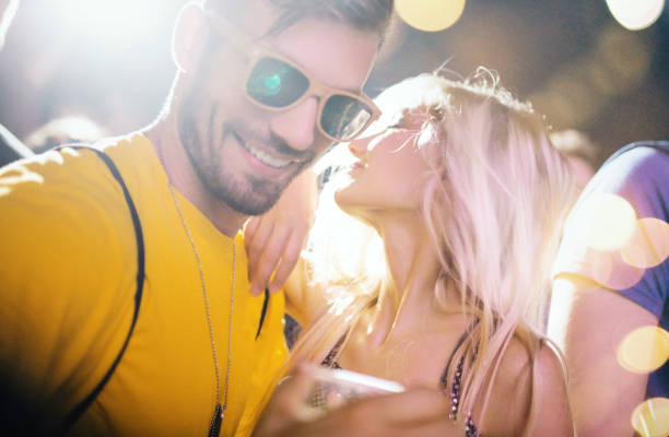 istock Flirting at music festival. 1167973089