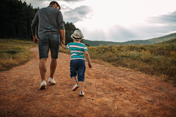 istock Father and son spending time in nature 1167973351