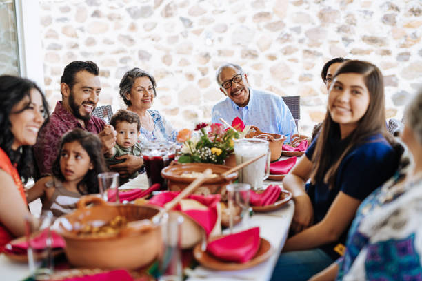 istock Latin American multi generation family having dinner together 1167975680