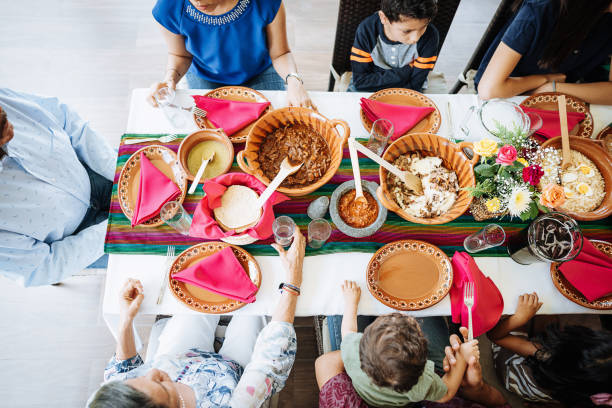 istock Three generation Latin American family at lunch - high angle view 1167975778