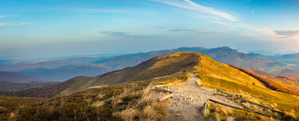 istock Mountain landscape at sunset in autumn. Mountain peak meadow. 1167975873