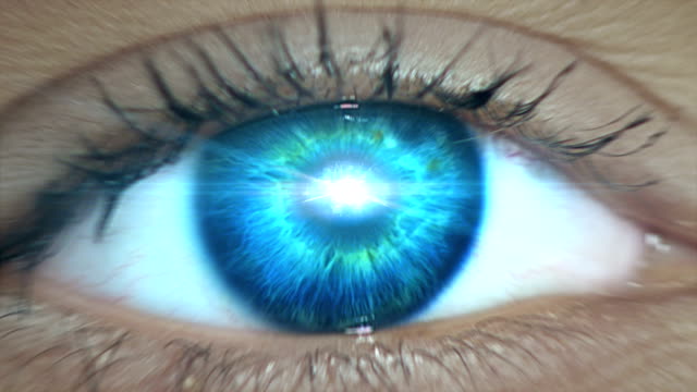 Extreme closeup on blue eye. Entering human mind