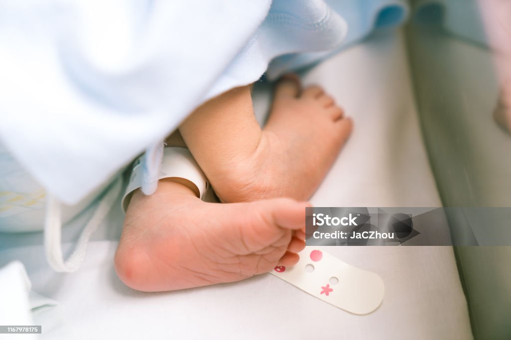 Photo of newborn baby feet Baby - Human Age, Foot, Newborn, Human Foot Baby - Human Age Stock Photo
