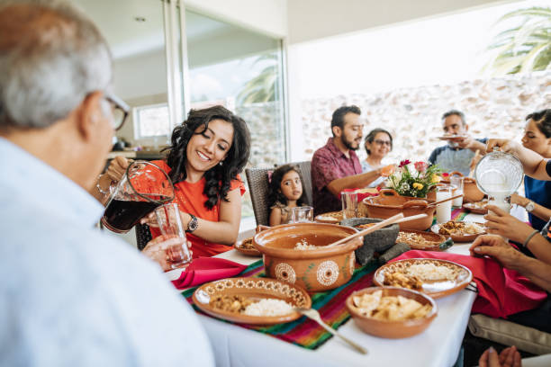 istock Three generation family at lunch enjoying being together 1167978520