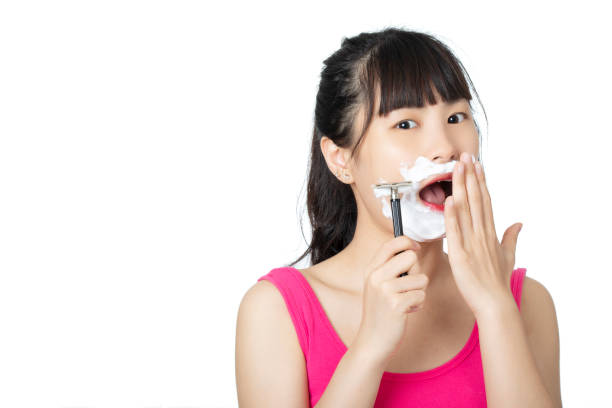 istock Chinese woman  shaving isolated on a white background 1167978535