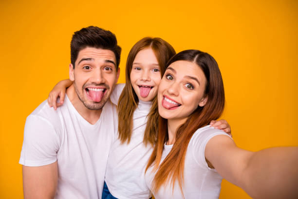 istock Self-portrait of three nice attractive charming cute lovely cheerful cheery glad crazy comic childish playful person embracing having fun isolated over bright vivid shine yellow background 1167982122