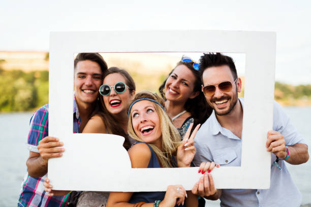 istock Group of young happy friends having fun time 1167983515