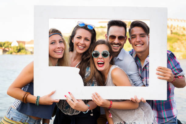 istock Group of young happy friends having fun time 1167983556