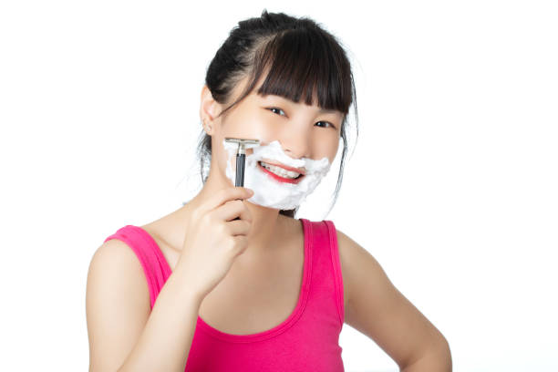 istock Chinese woman  shaving isolated on a white background 1167983999