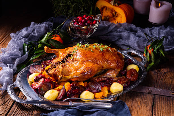 istock roast duck with potato dumplings and plums 1167987243