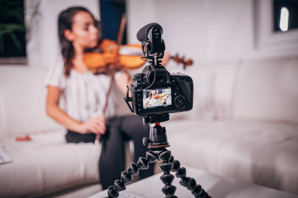 istock Violinist Woman Vlogging 1167988879