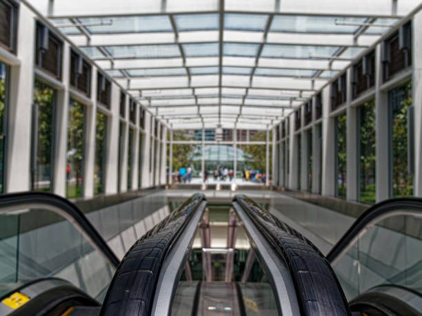 An electric escalator inside a commercial office building