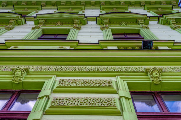 istock Old apartment building with a green facade 1167990877