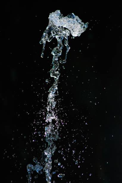 istock splashing water on dark background, shapes 1167995880