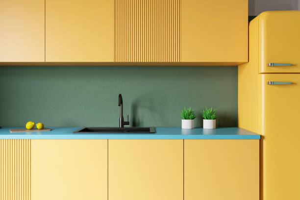 istock Yellow countertops in green kitchen 1167996185