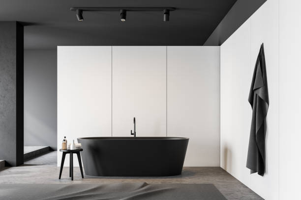 istock White and gray bathroom interior with tub 1167996235