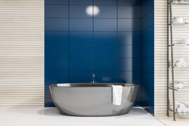 istock Blue tile and wood bathroom interior with tub 1167996703