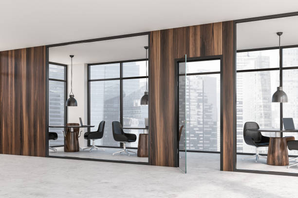 istock Dark wooden coworking office corner 1167996844