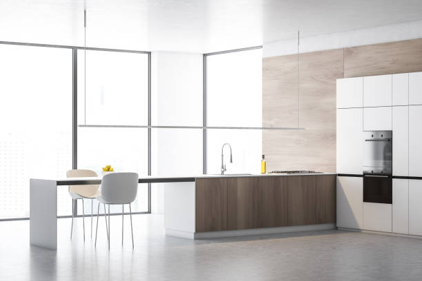 istock Corner of wooden loft kitchen with island 1167997973