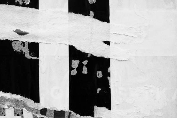 istock Old ripped blank torn paper crumpled creased posters grunge textures backdrop backgrounds placard stock photo 1167998489