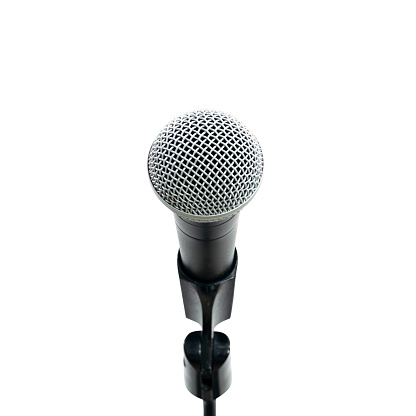Close up of high quality dynamic microphone on stand  isolated on white background with clipping path.