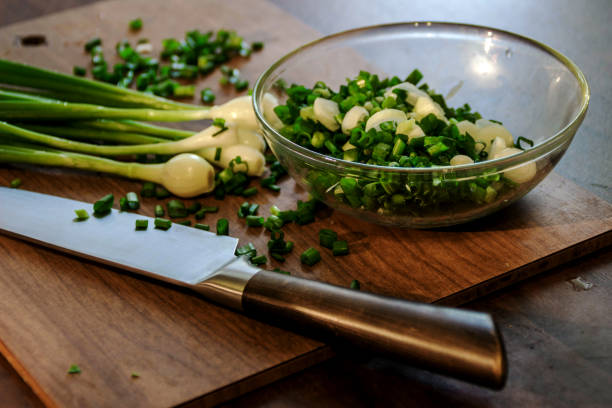 Chopped green onions in small cup